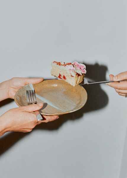 Coconut Raspberry Lime Leaf Cake KitEditorial Image of person making cake