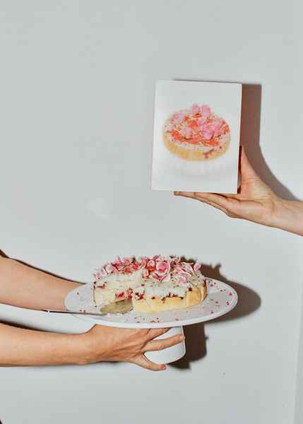 Coconut Raspberry Lime Leaf Cake KitEditorial Image of person making cake