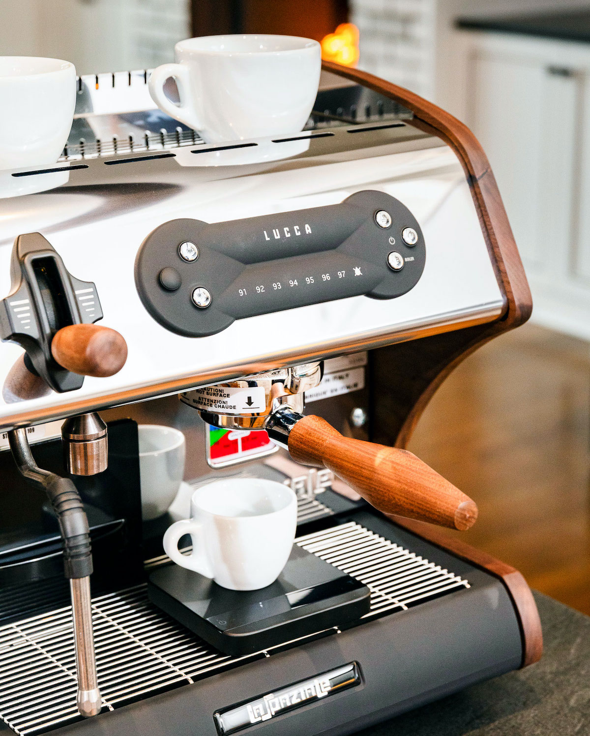 Close up of LUCCA A53 Mini making espresso. 