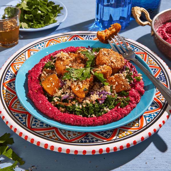 Middle Eastern bowl with pumpkin, kale, millet fritters & hommus