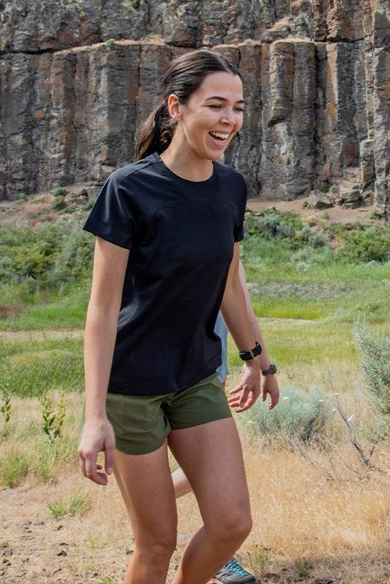 Woman hiking while wearing the OlallieLoop Short by Beyond Clothing. 