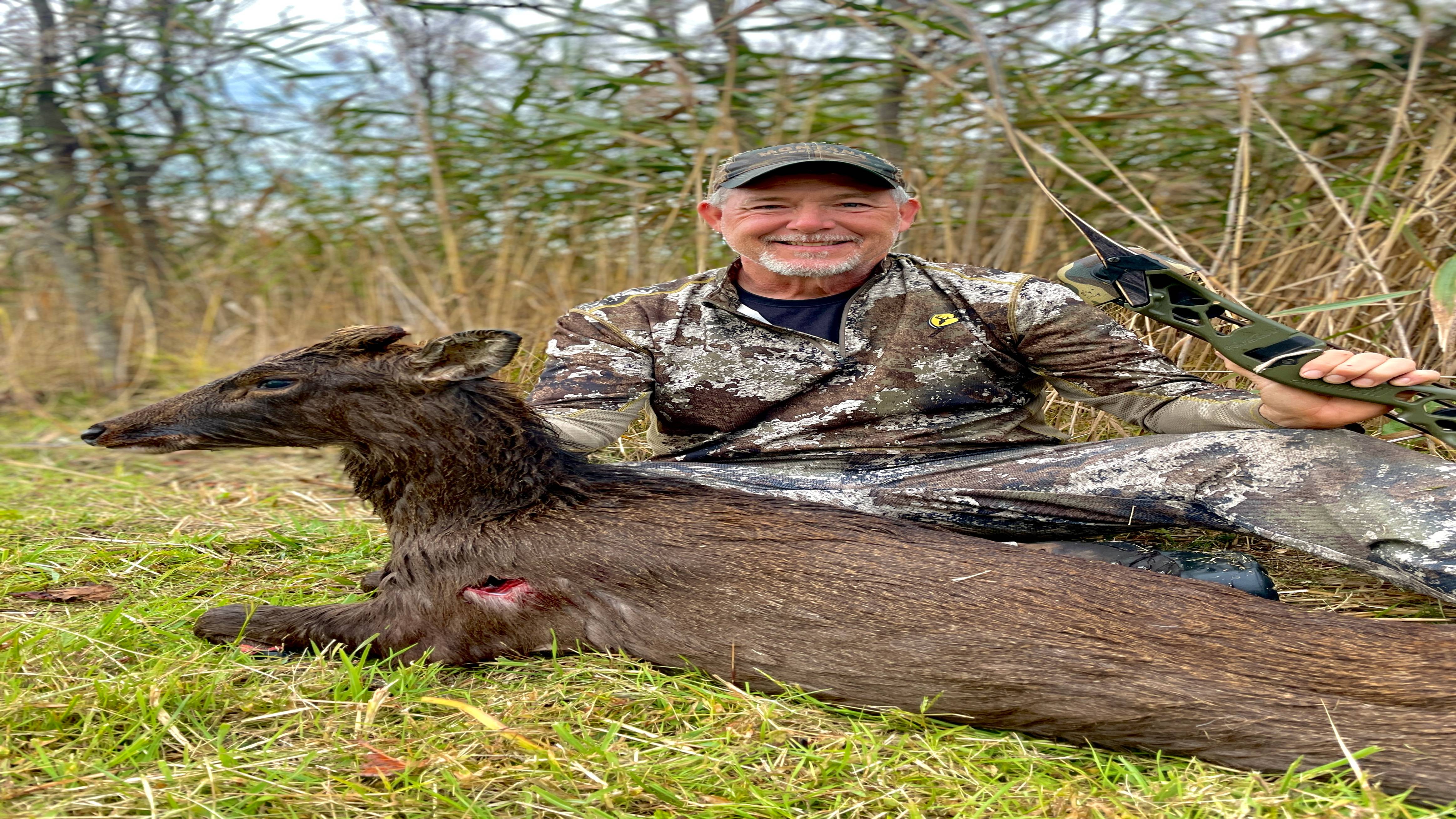 Fred Eicher using Fred Eichler Signature Series Riser Bow to harvest Sika Deer in Maryland