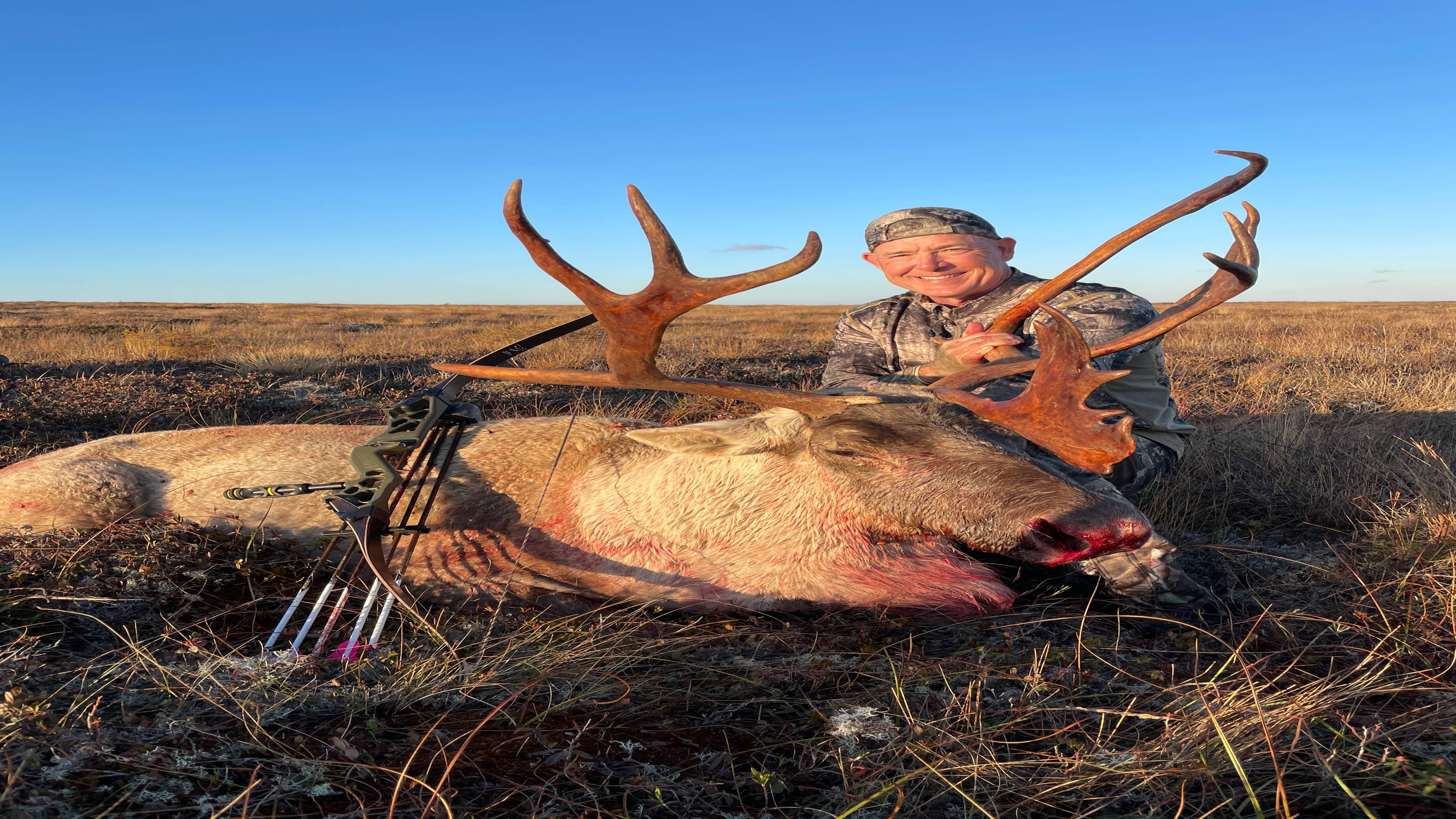 Fred Eicher using Fred Eichler Signature Series Riser Bow to harvest Caribou.