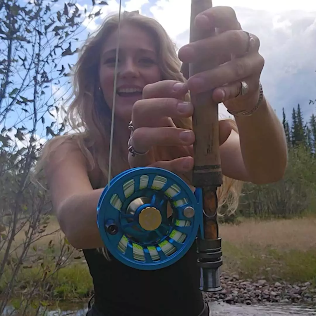 Fly fisher Learning to Fish with Craig Fly Rod and Envy 406 Reel