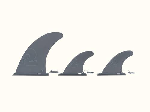 A set of three grey paddleboard slide-in fins.