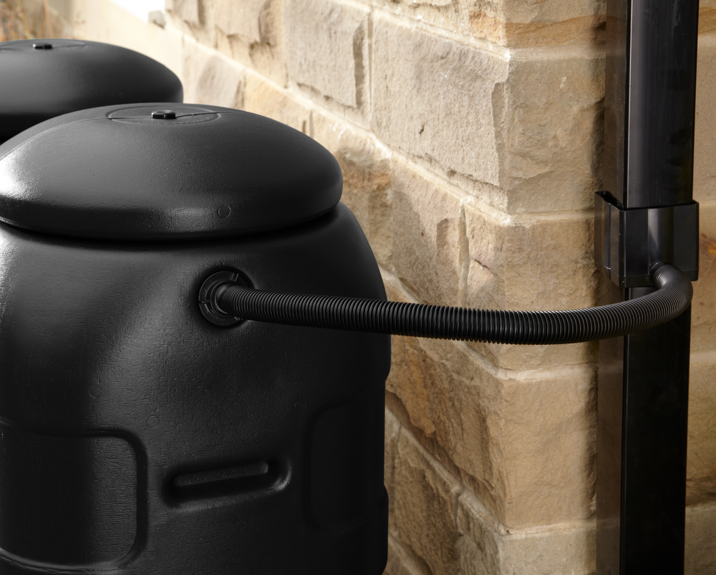 Mini Rainsaver 100 Litre Black Water Butt Kit in situ