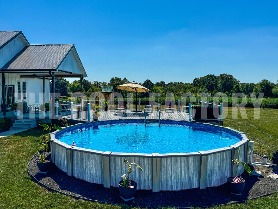 Backyard above ground round pool with sunlit deck and green landscaping