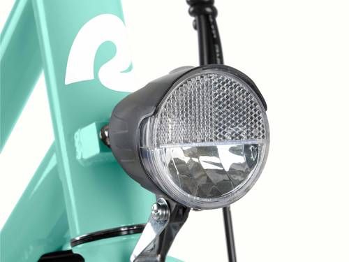 A close-up of the ebike's headlamp mounted on a teal bike frame.