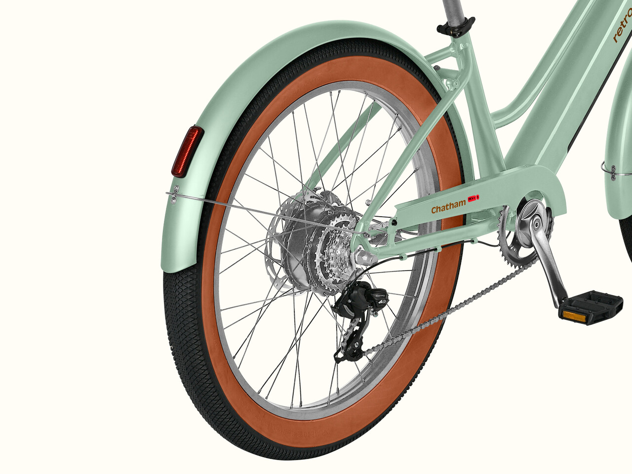 Close-up of the Chatham Rev+ 2 Beach Cruiser Electric Bike's rear wheel.