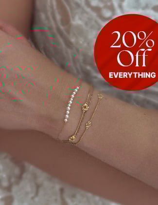 On figure bridal jewelry featuring a gold bracelets