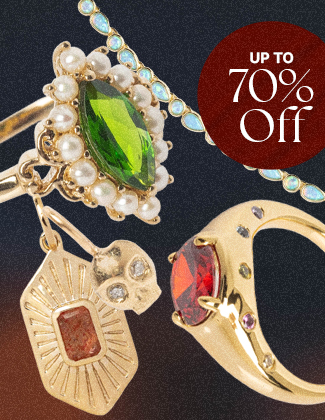 Two gold rings, a gold necklace, and gold earrings with opal gemstones
