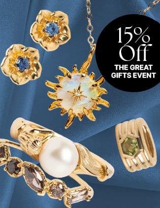 A collage of gold jewelry over a blue fabric background with a badge that reads 15% off the great gifts event