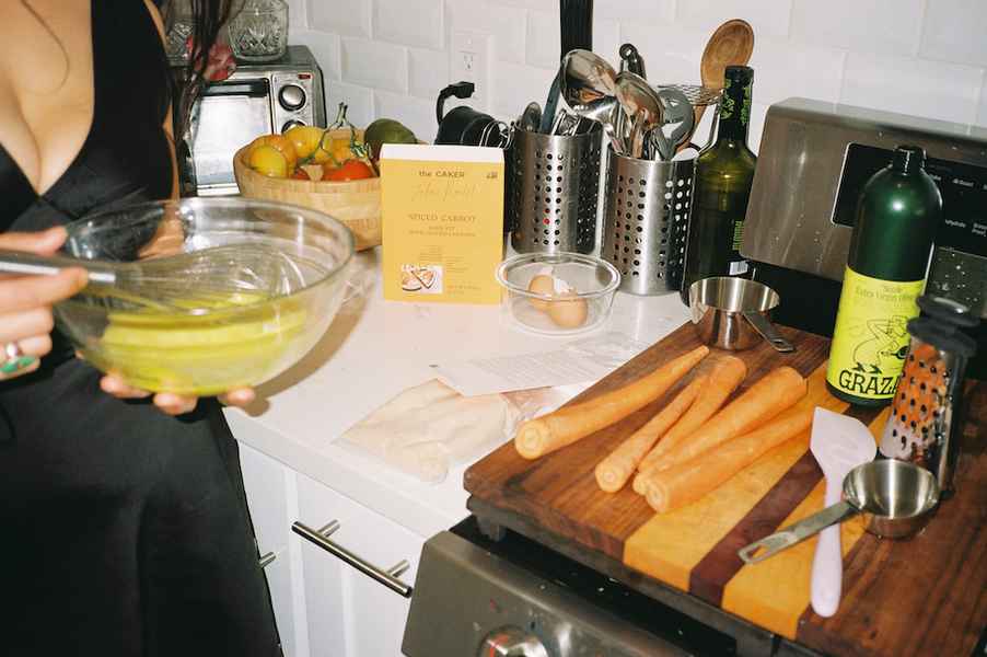 Decadence BundleEditorial Image of person making cake