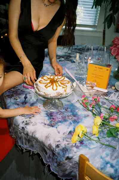 Decadence BundleEditorial Image  of person making cake