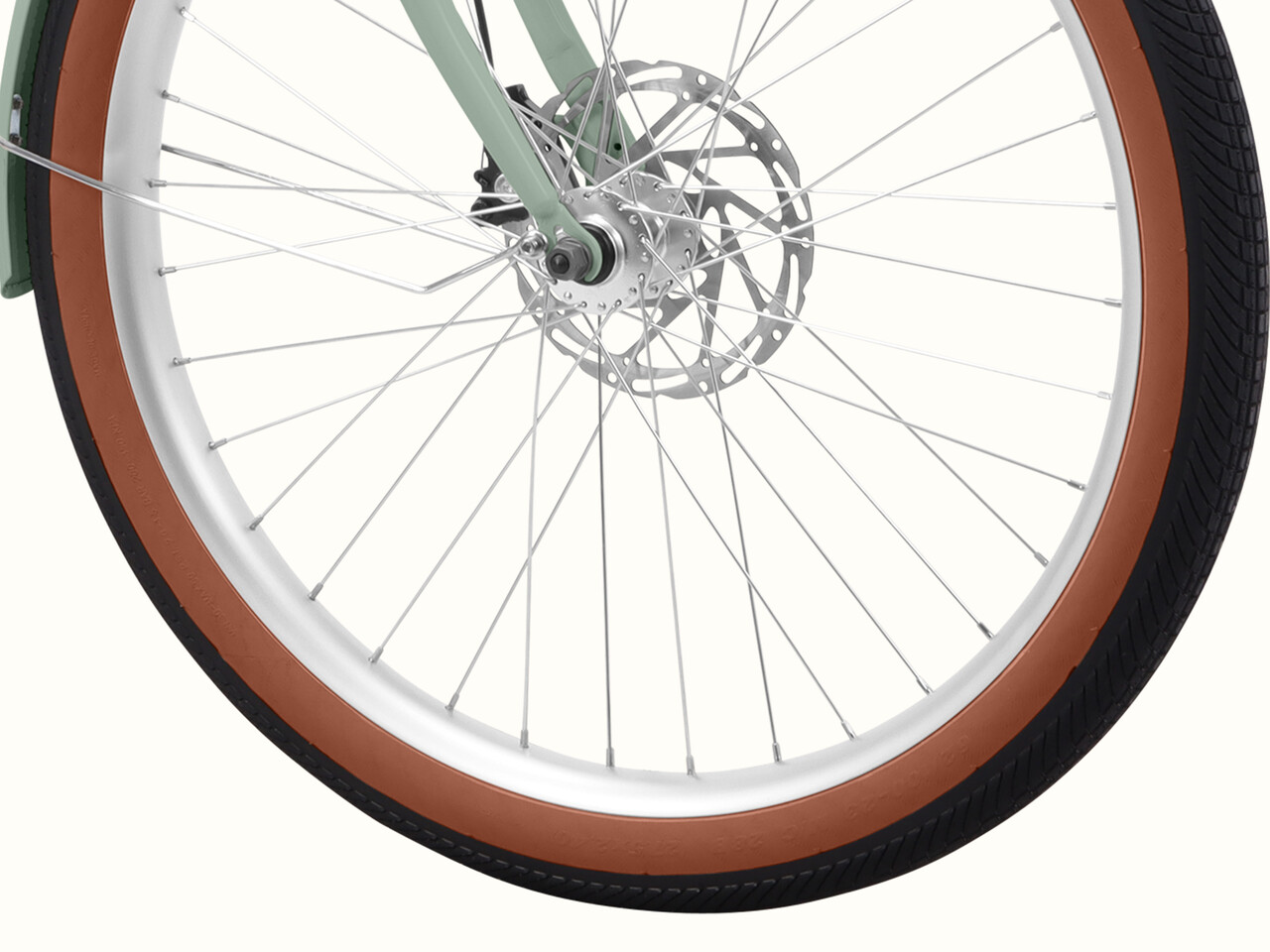 A close-up of the Beaumont Rev 3 City Electric Bike - Step Through tire.