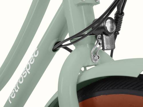 A close-up of the Beaumont Rev 3 City Electric Bike - Step Through's headlight.