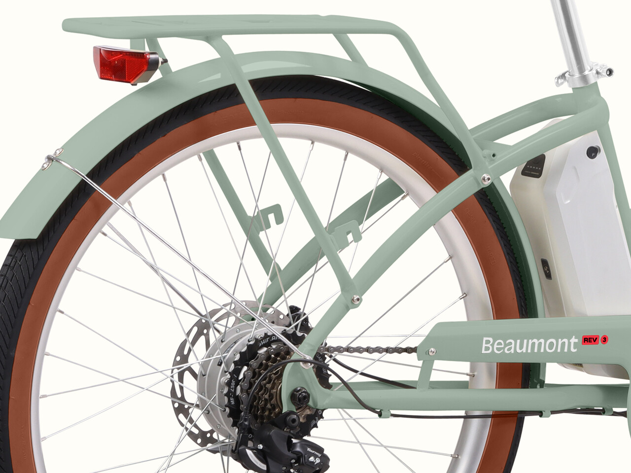 A close-up of the Beaumont Rev 3 City Electric Bike - Step Through's rear wheel.