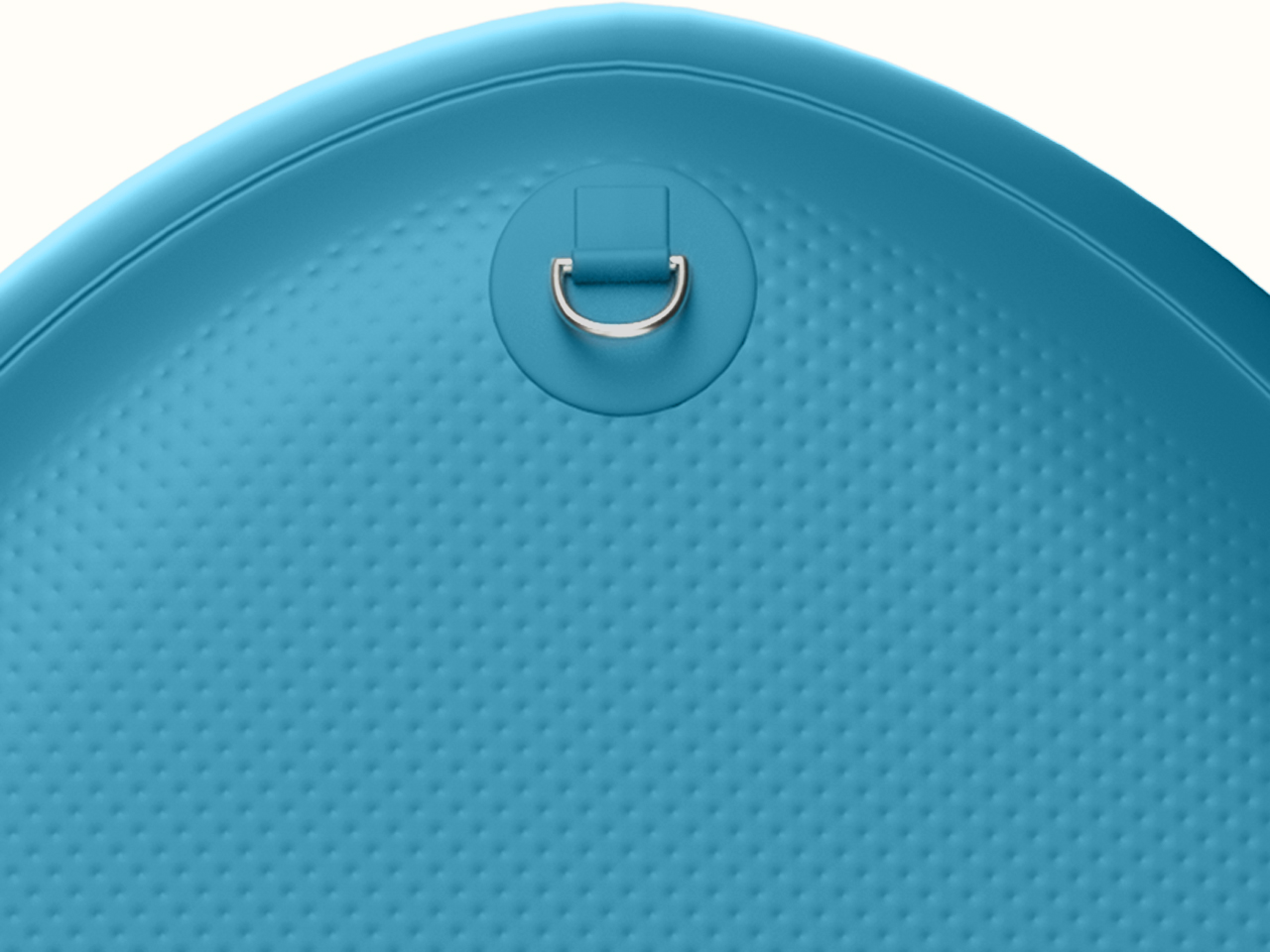 A close-up of the underside of the inflatable paddle board showcasing a D-Ring to attach a leash, anchor, or other accessories.