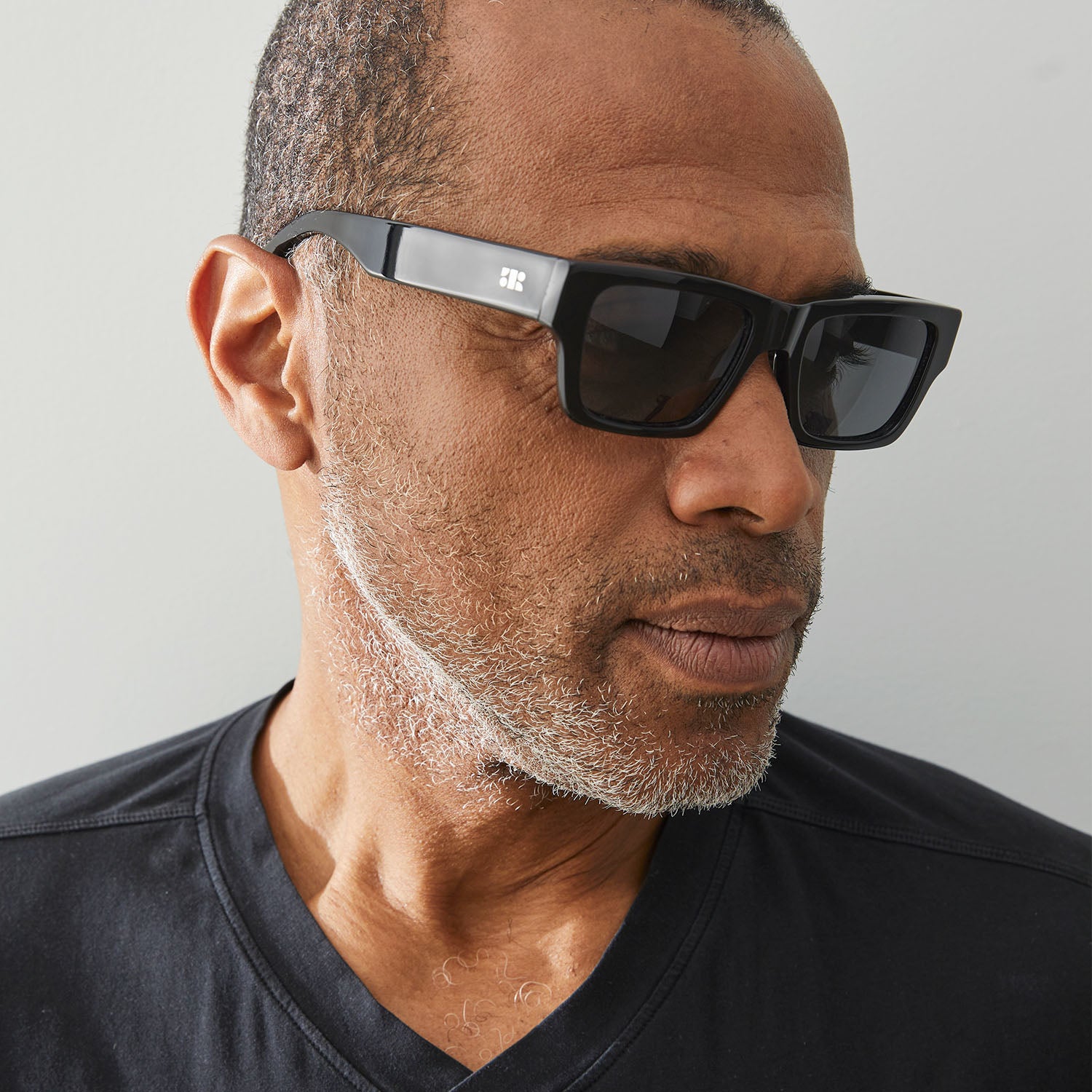 Photo of a man or woman wearing Aimé Sun Grey Sun Glasses by French Kiwis