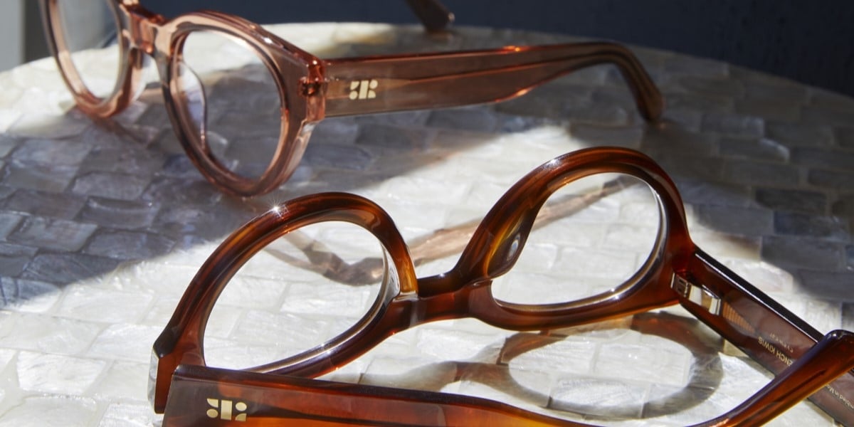 Photo Details of Florence Clear Tan Reading Glasses in a room