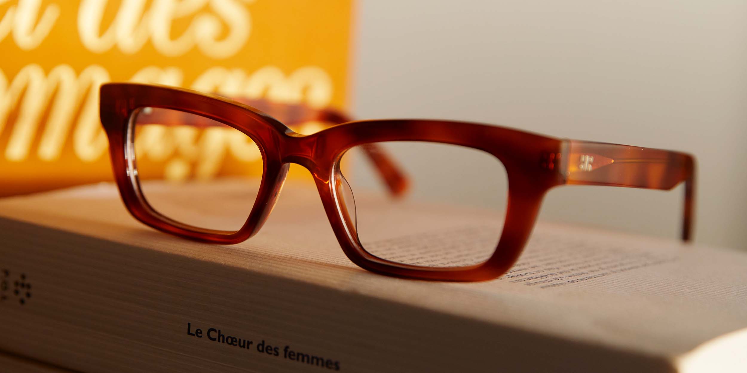 Photo Details of Margot Cognac Reading Glasses in a room