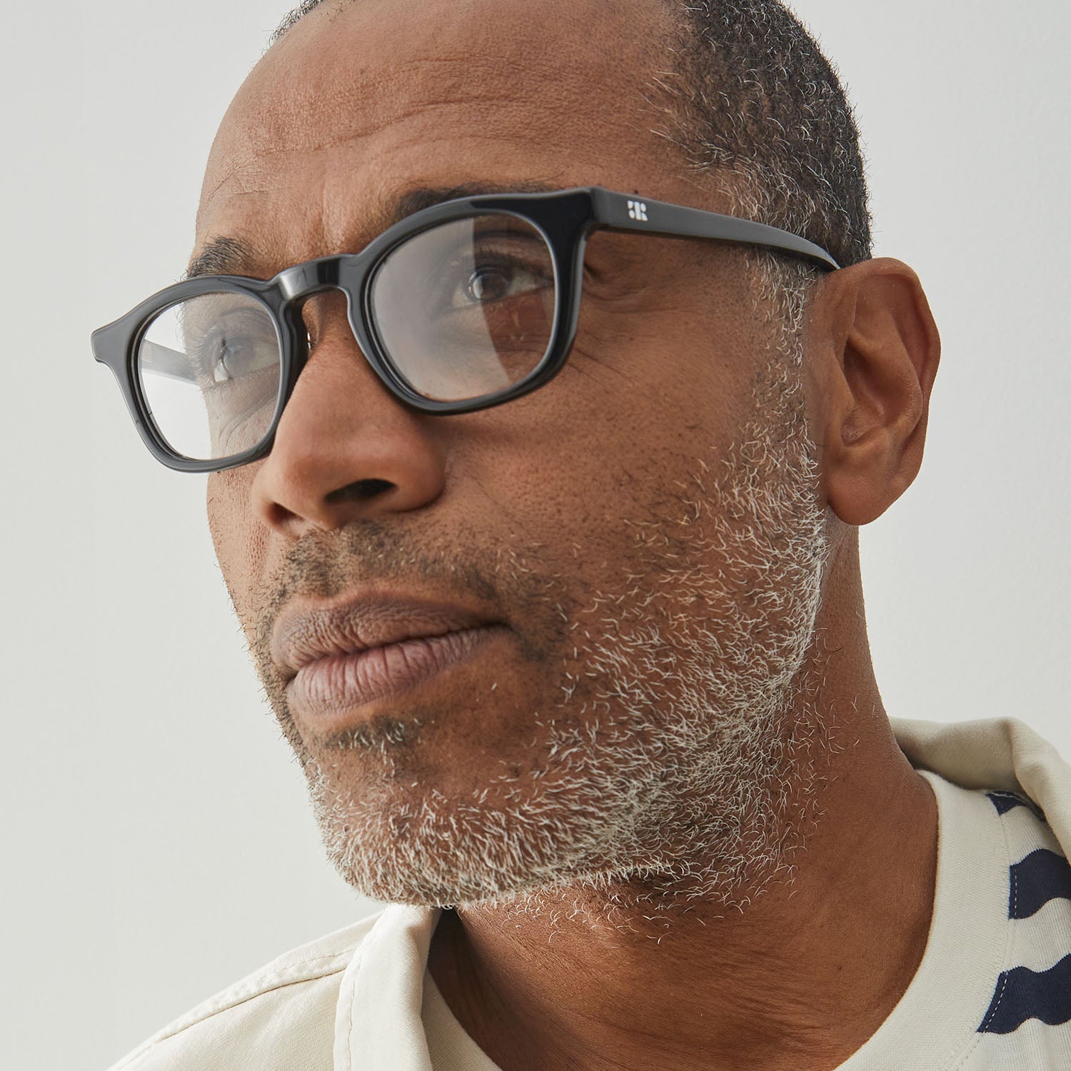 Photo of a man or woman wearing Thomas Clear Grey Reading Glasses