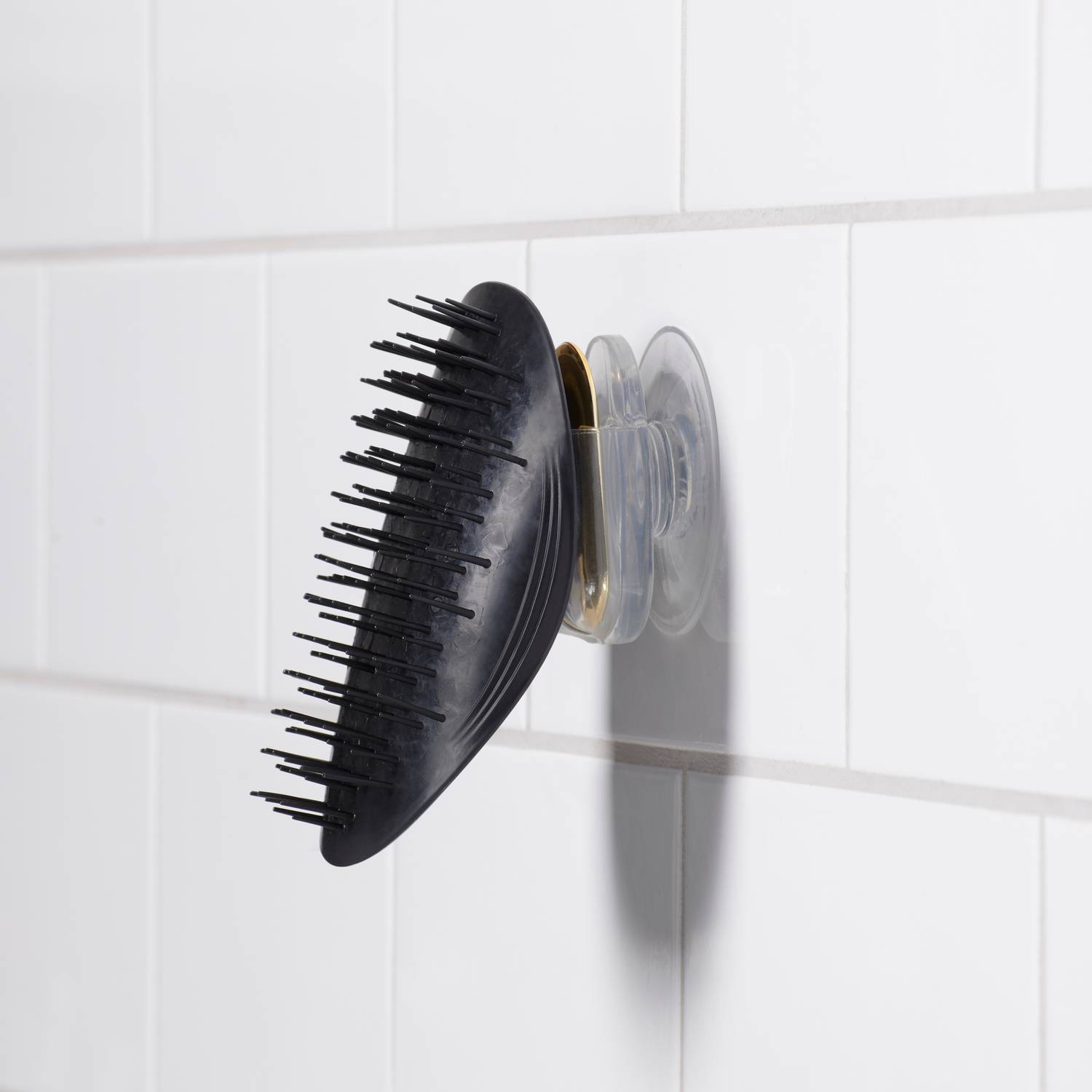 Manta shower holder on bathroom wall