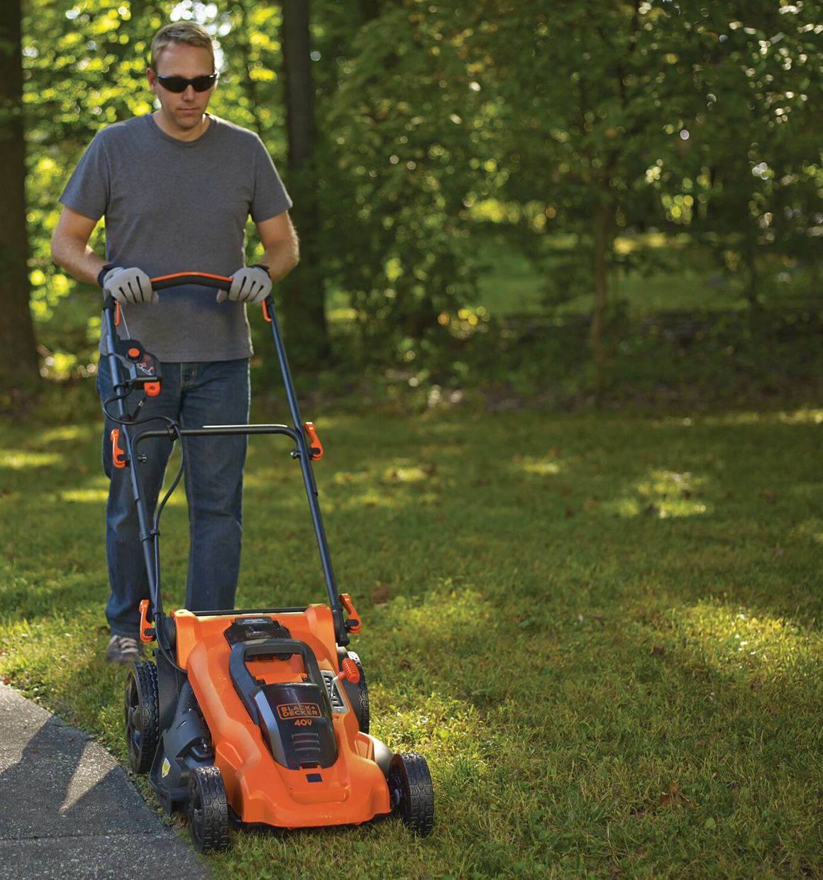 Black and Decker 40 volt MAX Lithium Ion 20 inch Mower being used by a person