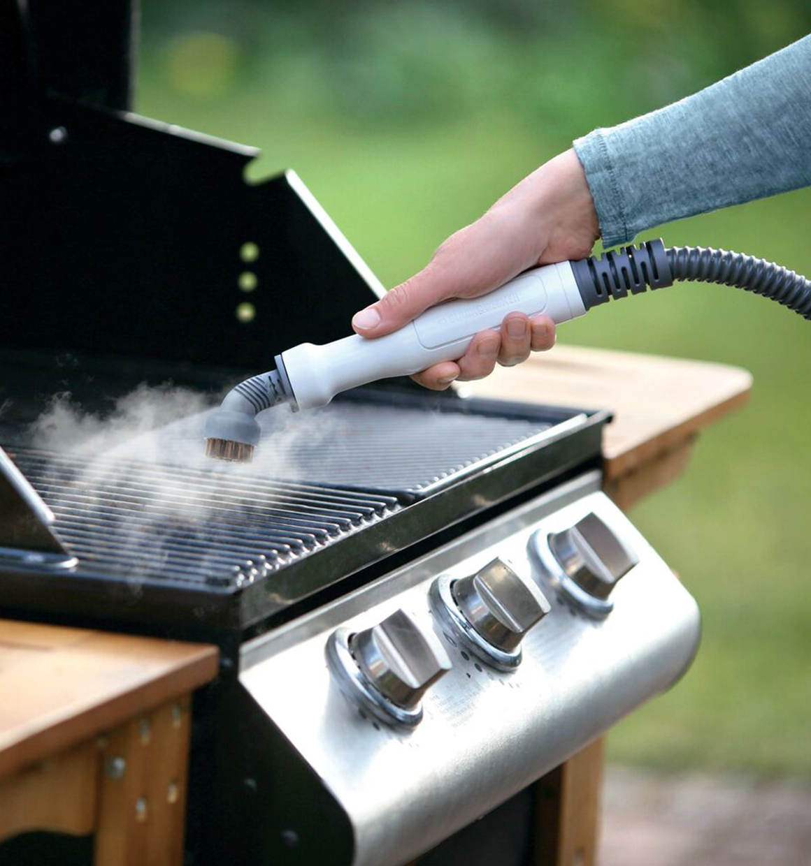 5 in 1 steam mop and portable steamer being used.