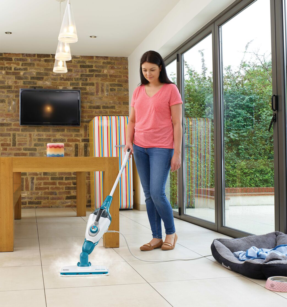 7 in 1 Steam Mop with Steam Glove Handheld Steamer being used for cleaning floor of house by person.