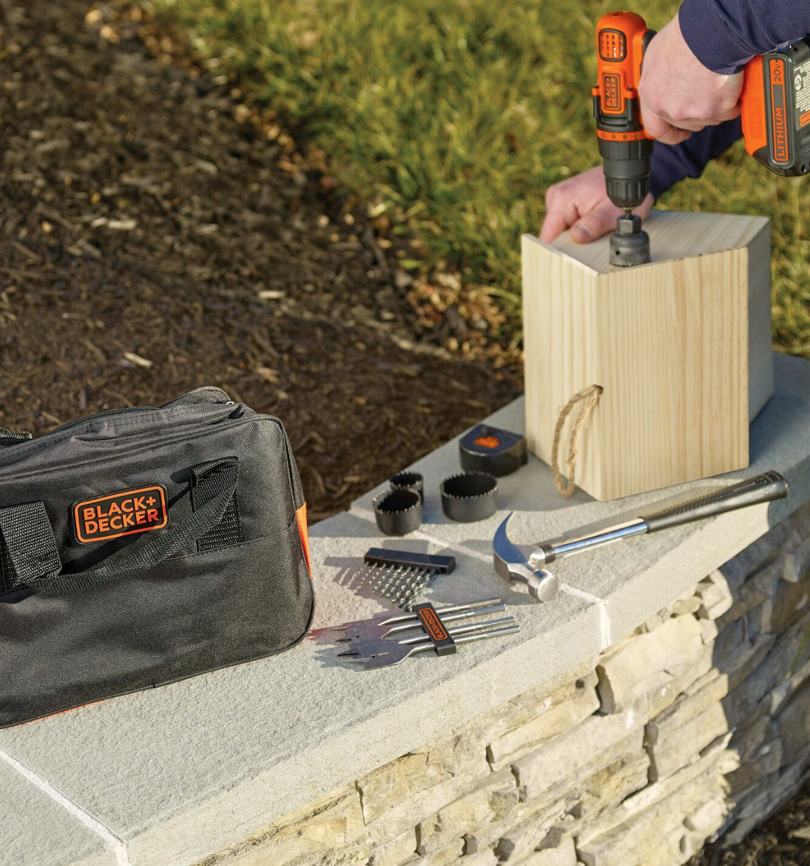 20V Max Drill and a Hole Saw Blade being used to cut a door in a bird house.