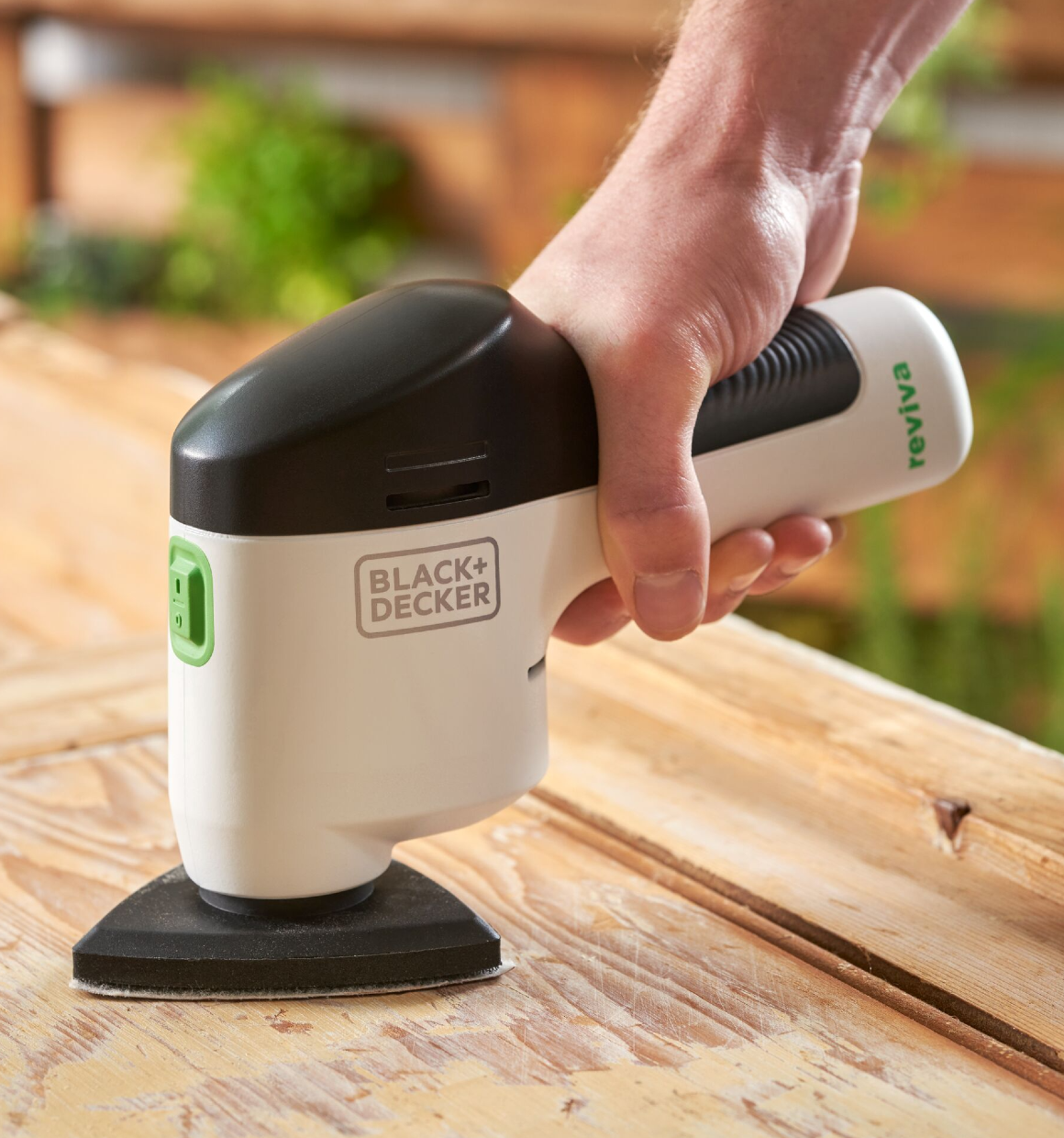 Reviva 12V Sander being used to smooth and refurbish furtniture.