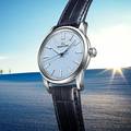 Grand Seiko SBGX353 wristwatch with blue snowflake dial and blue strap.