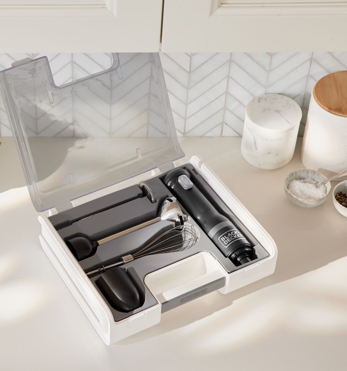 Birdseye view of the BLACK+DECKER kitchen wand storage case lying on countertop with the lid open