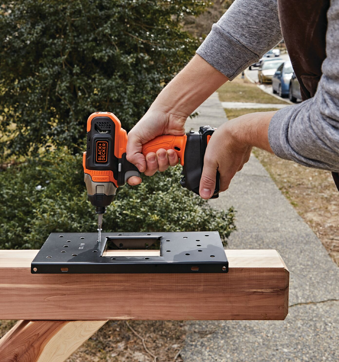 Cordless Impact Driver being used to install letterbox mount.