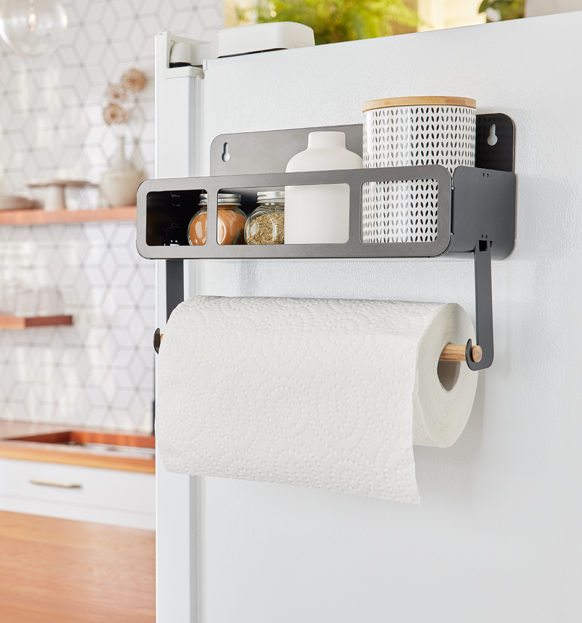 Hanging Rack System-Shelf W/Brackets hanging on a fridge with spices and paper towels.