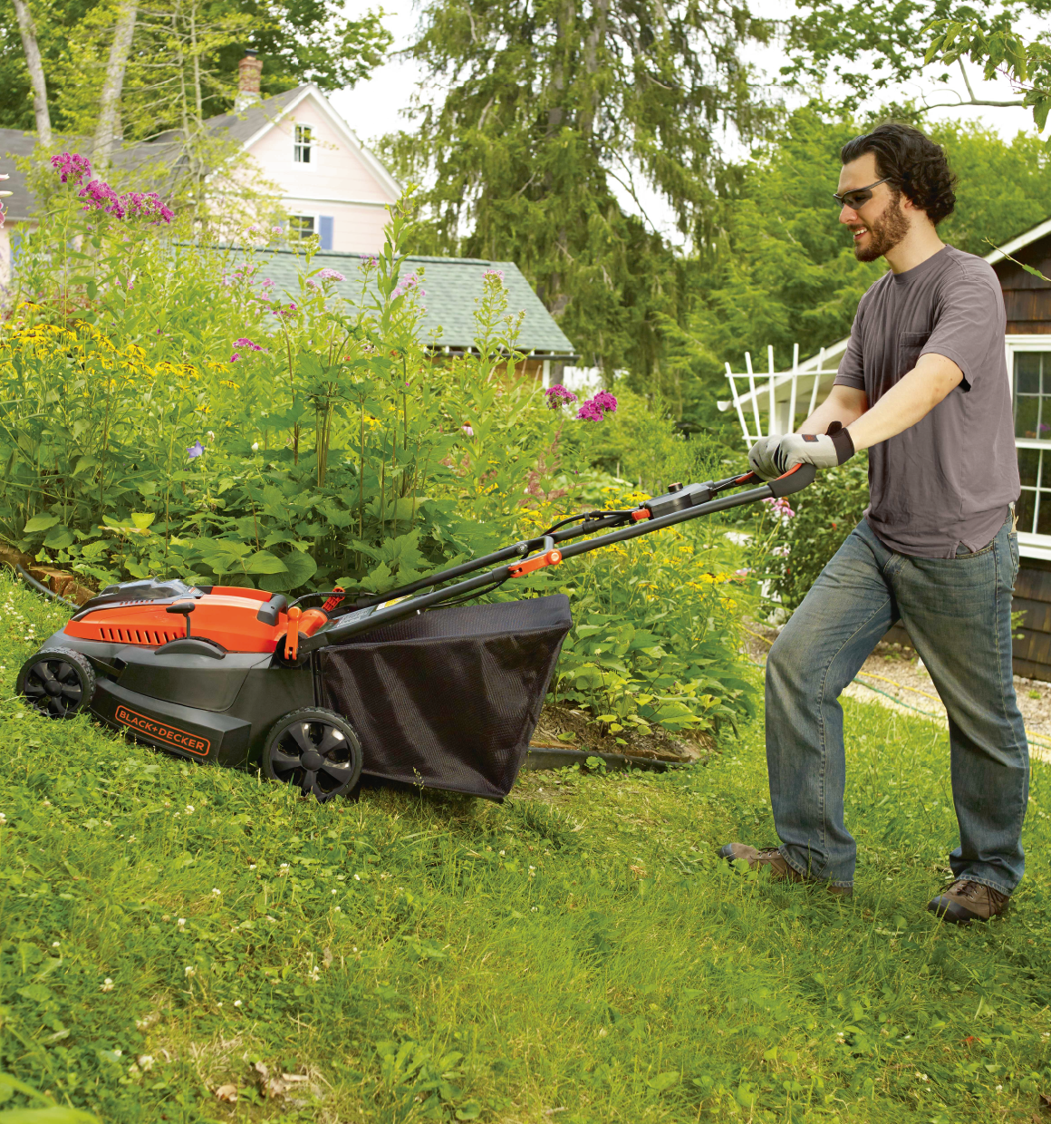 Lithium 16 inch Mower being used for mowing grass.