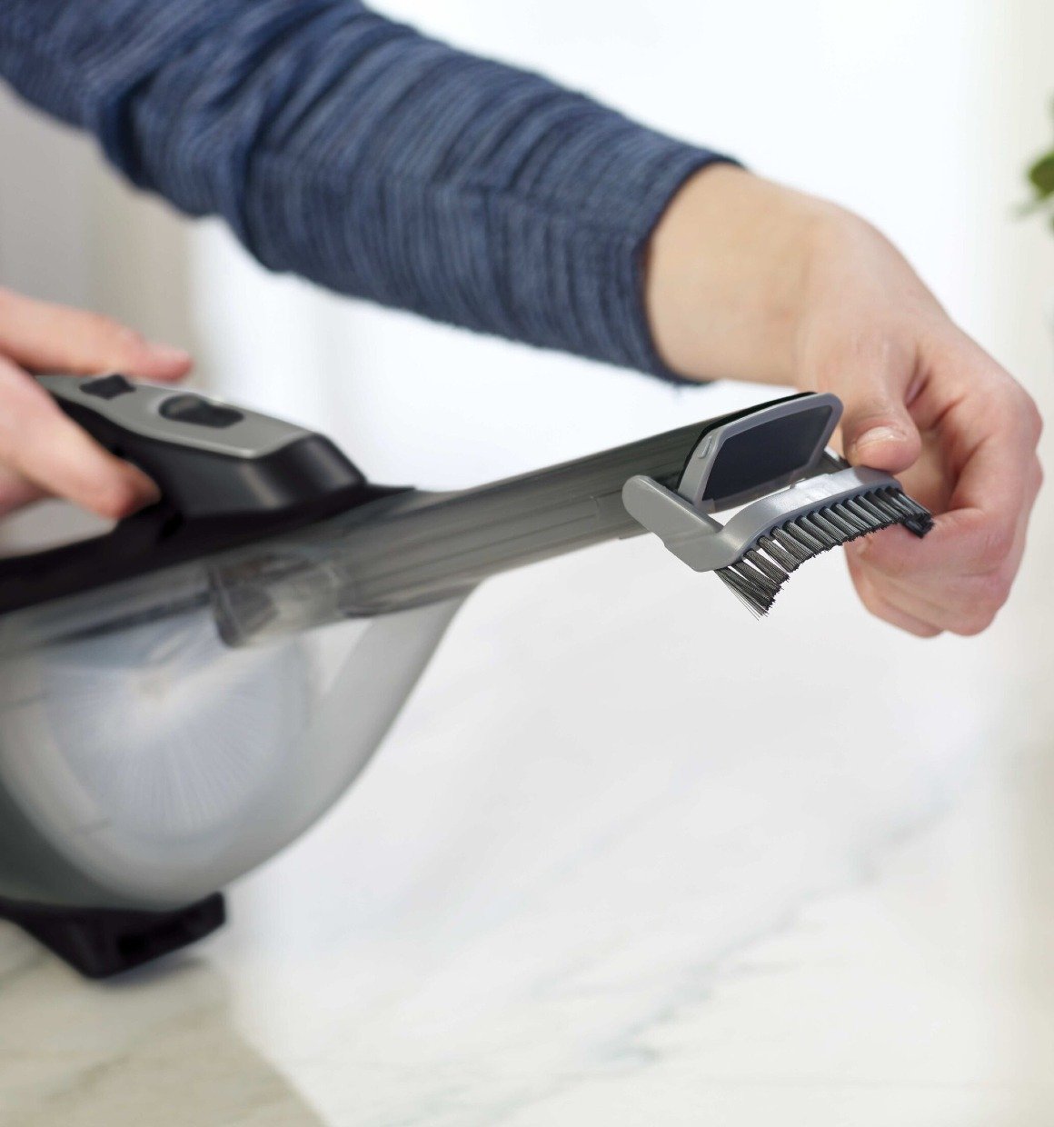 Flip up brush feature of dustbuster advancedclean cordless hand vacuum.