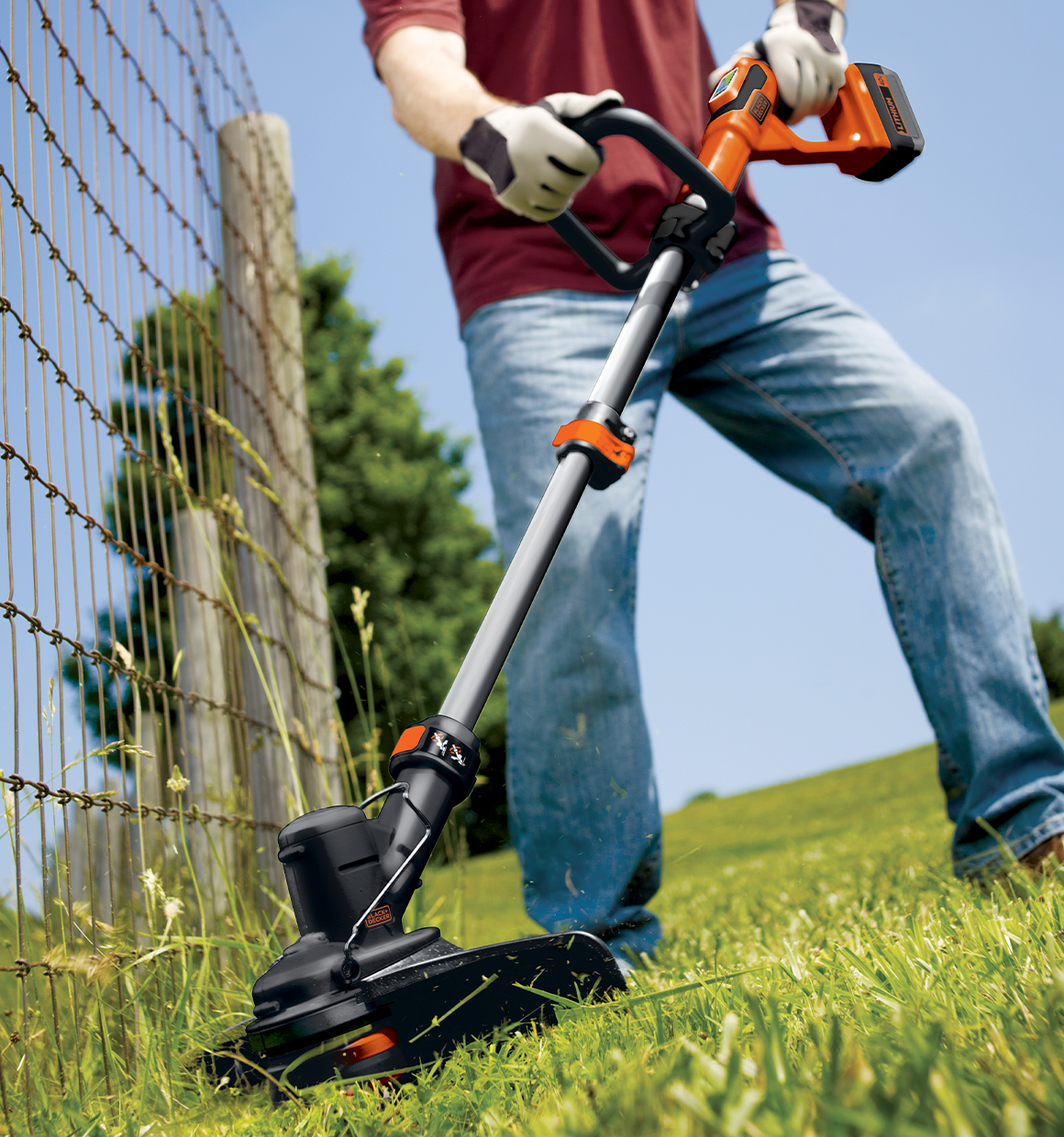 Lithium String Trimmer being used for trimming grass from edges.