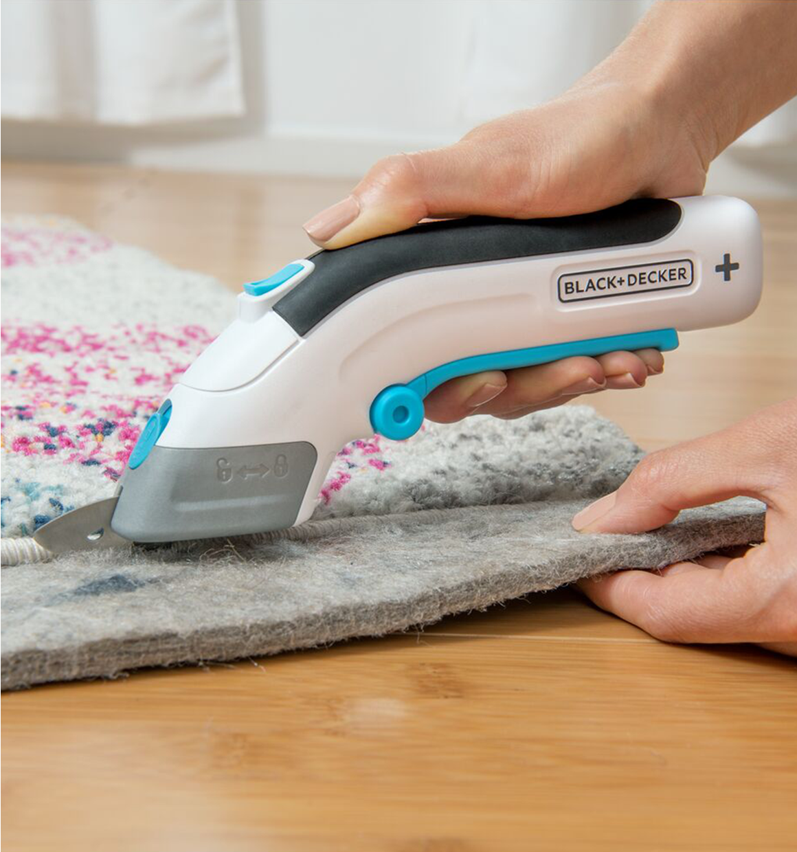 Close-up of cutting carpet padding.