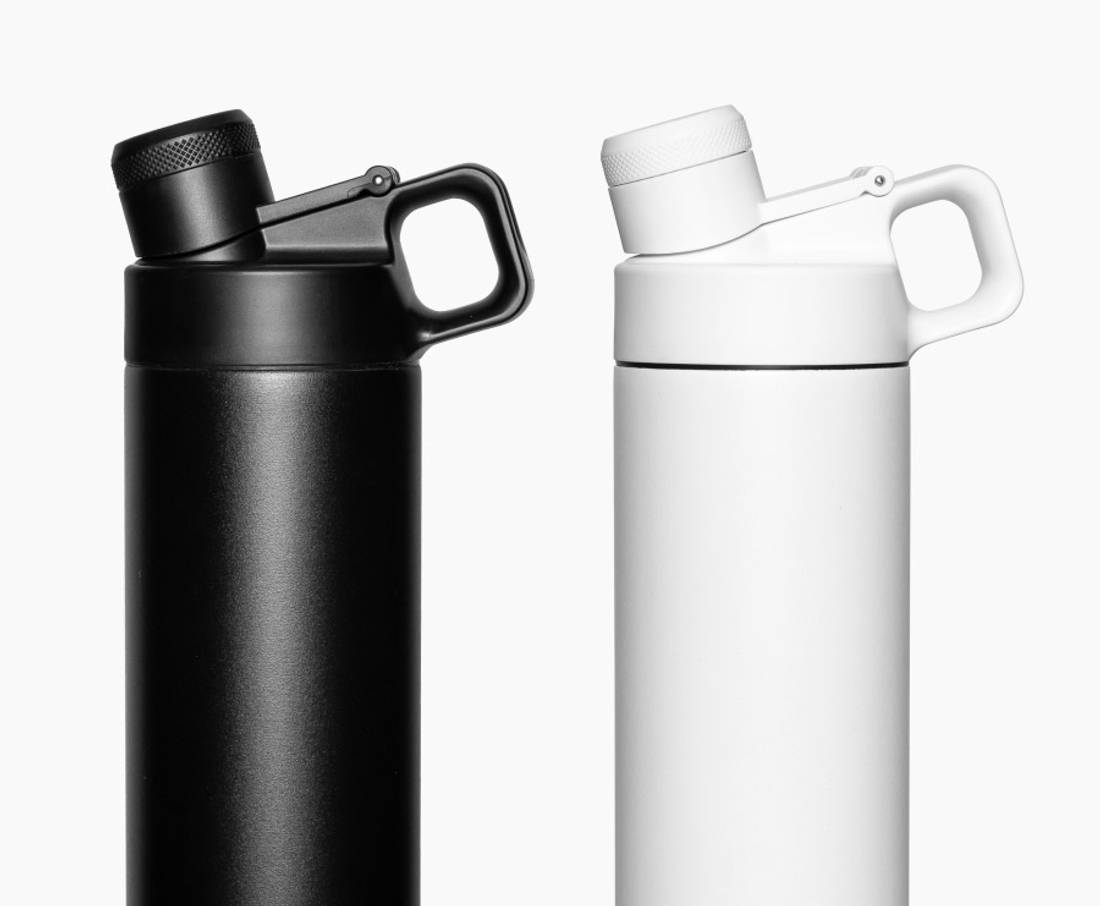 A black and white Chug Lid Bottle next to each other