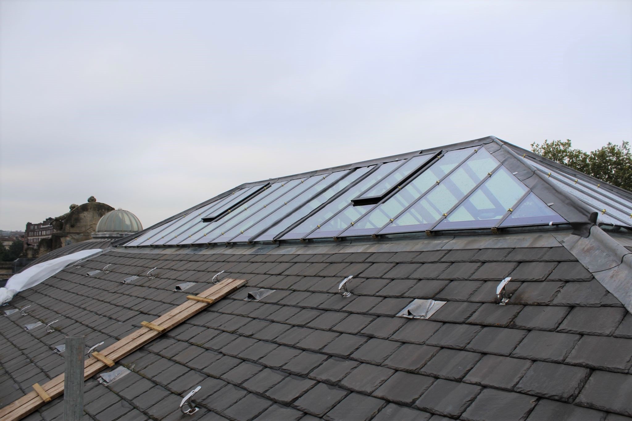 A rooftop with lantern windows 