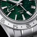 Grand Seiko SBGE295 Spring Drive GMT with green dial. 