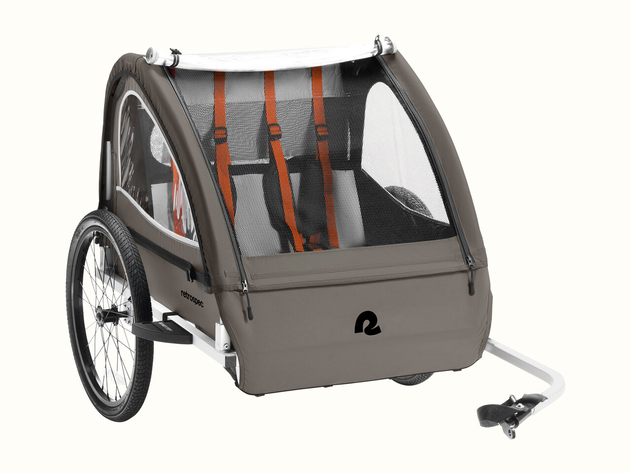 This kids’ bike trailer’s sturdy, weather-resistant fabric and 2-in-1 canopy work in tandem to protect little passengers from wind, rain, bugs, and debris kicked up from the road.