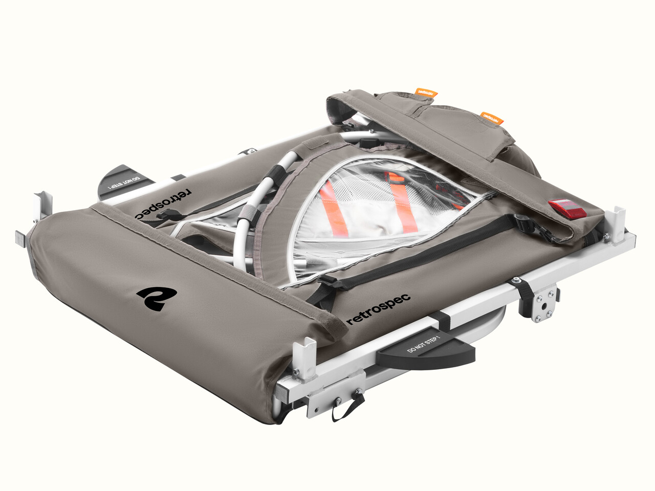 The bike trailer’s lightweight aluminum frame folds into a compact, portable size for easy storage and transport.