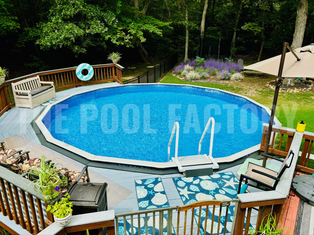 Round above ground pool with an outdoor umbrella for shade and wooden deck surround 