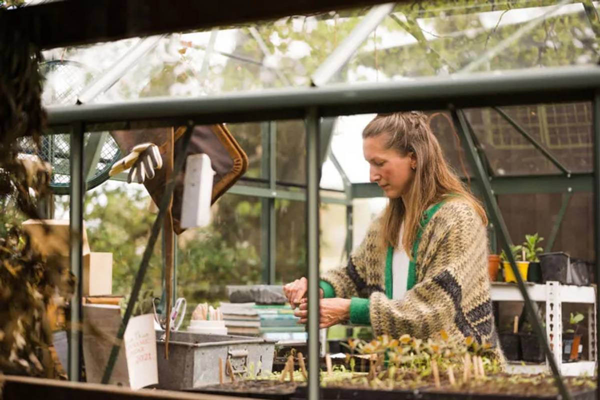 Woman in her greenhouse