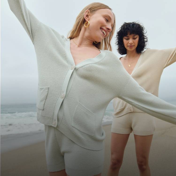 Models wearing the Textured Shorts and Balloon Sleeve Cardigan
