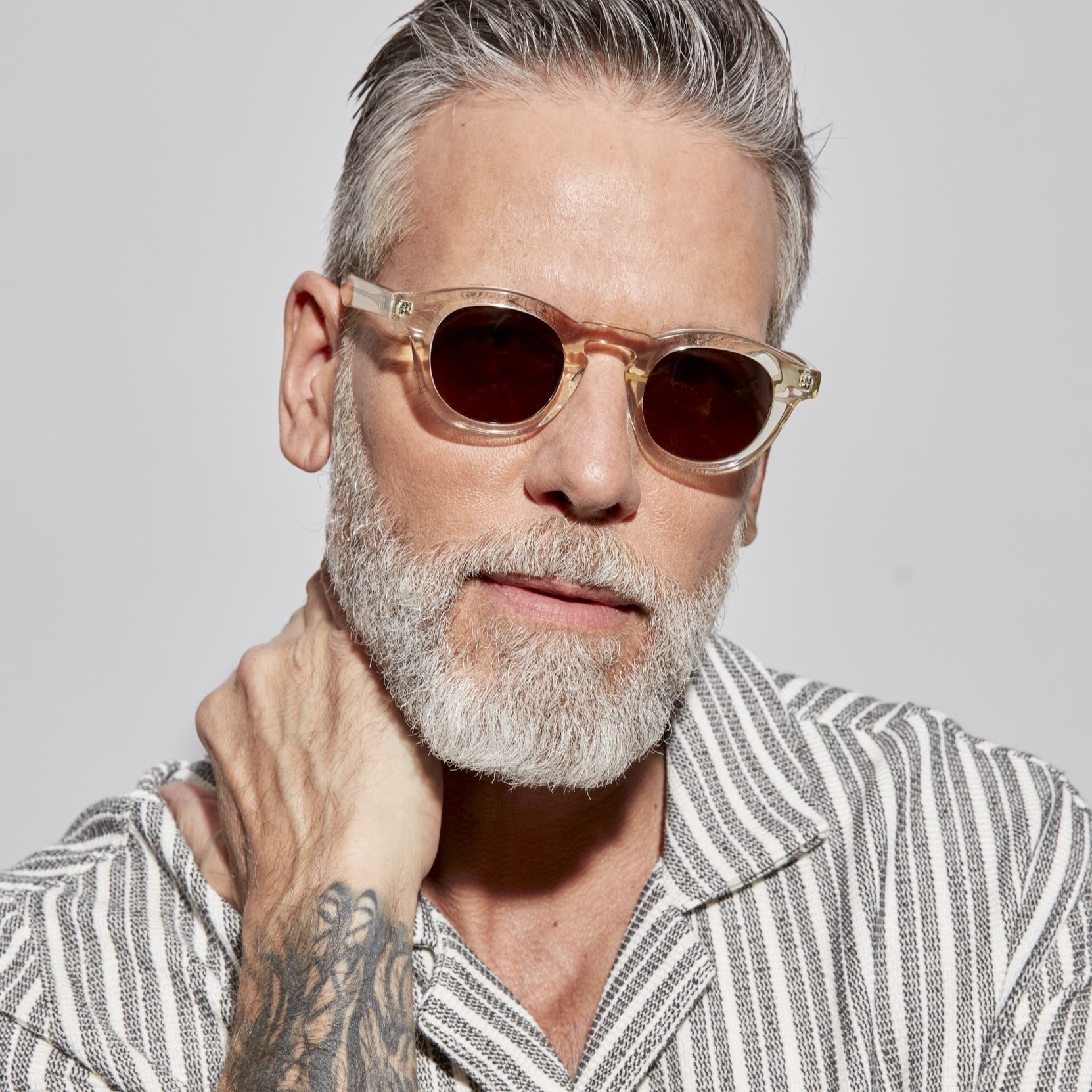 Photo of a man or woman wearing Jude Sun Grey Tortoise Sun Glasses by French Kiwis