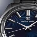 Grand Seiko SBGW299 blue dial sun ray pattern watch.